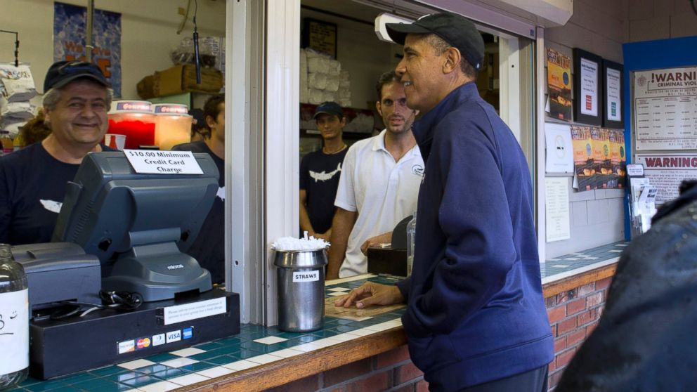 PHOTO: President Barack Obama orders lunch at Nancy's restaurant in Oak Bluffs, Mass., on the island of Martha's Vineyard, Aug. 13, 2013.