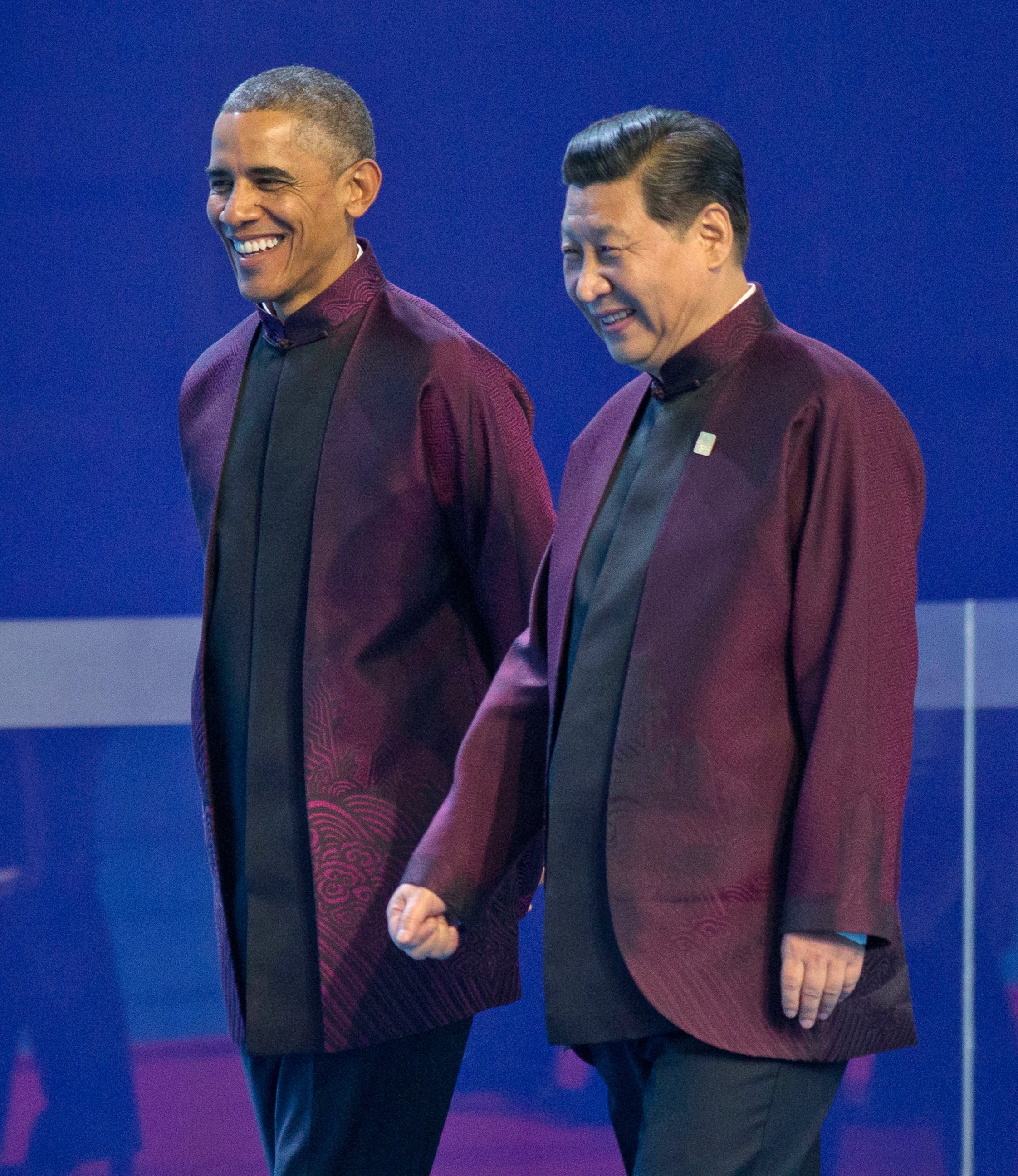 PHOTO: U.S. President Barack Obama, left, and Chinese President Xi Jinping walk during the Asia-Pacific Economic Cooperation (APEC) Summit family photo, Nov. 10, 2014 in Beijing.