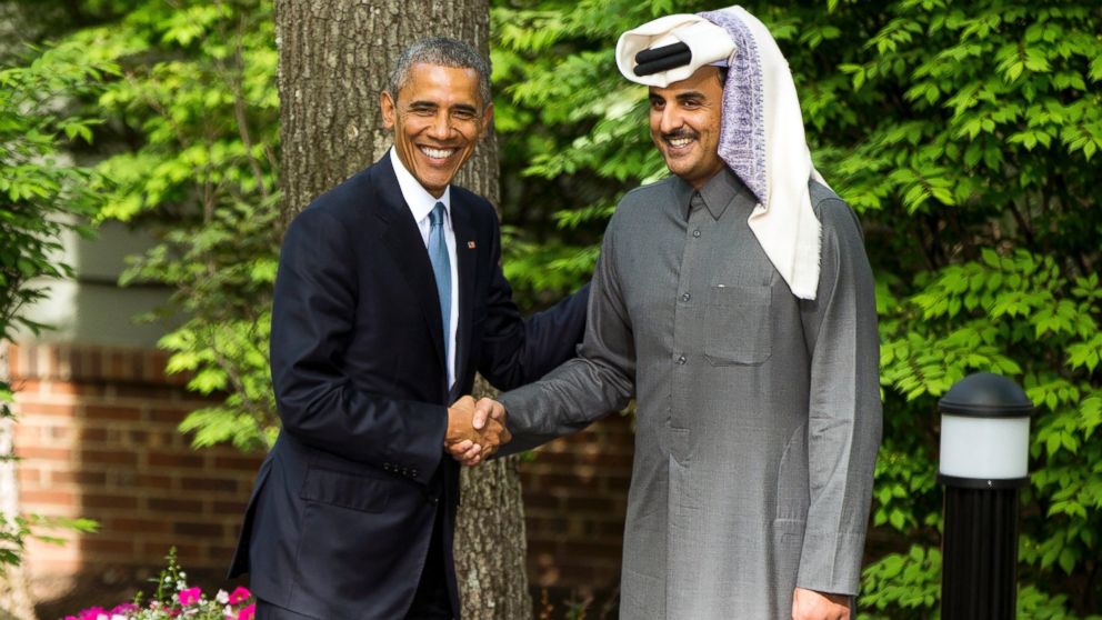 President Barack Obama shakes hands with Qatar Emir Sheik Tamim bin Hamad Al-Thani after meeting with Gulf Cooperation Council leaders at Camp David in Maryland, May 14, 2015.