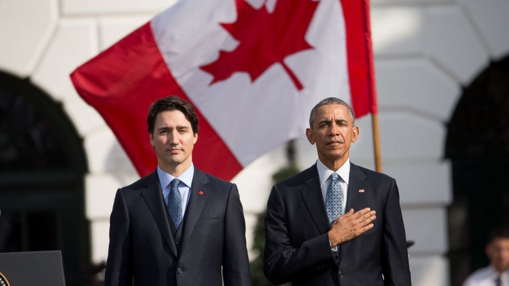 President Barack Obama and Canadian Prime Minister Justin Trudeau stand for the playing of national anthems during an arrival ceremony on the South Lawn of the White House in Washington, March 10, 2016.