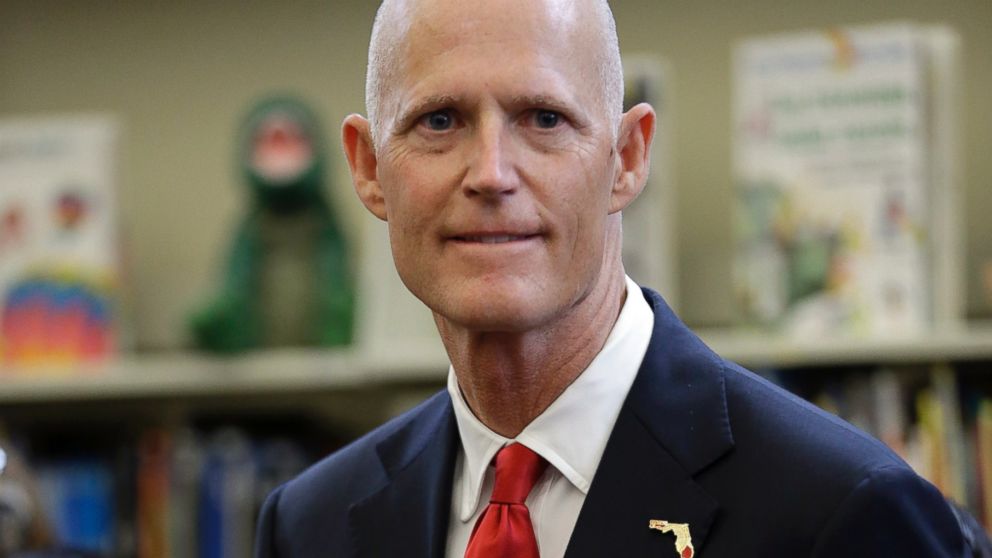 PHOTO: Florida Gov. Rick Scott waits to speak at the Dr. Carlos J. Finlay elementary school, June 1, 2015, in Miami.