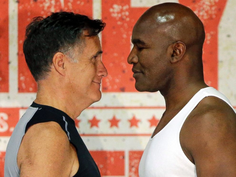 PHOTO: Mitt Romney, left, and Evander Holyfield, right, face each other during an official weigh-in on May 14, 2015, in Holladay, Utah.