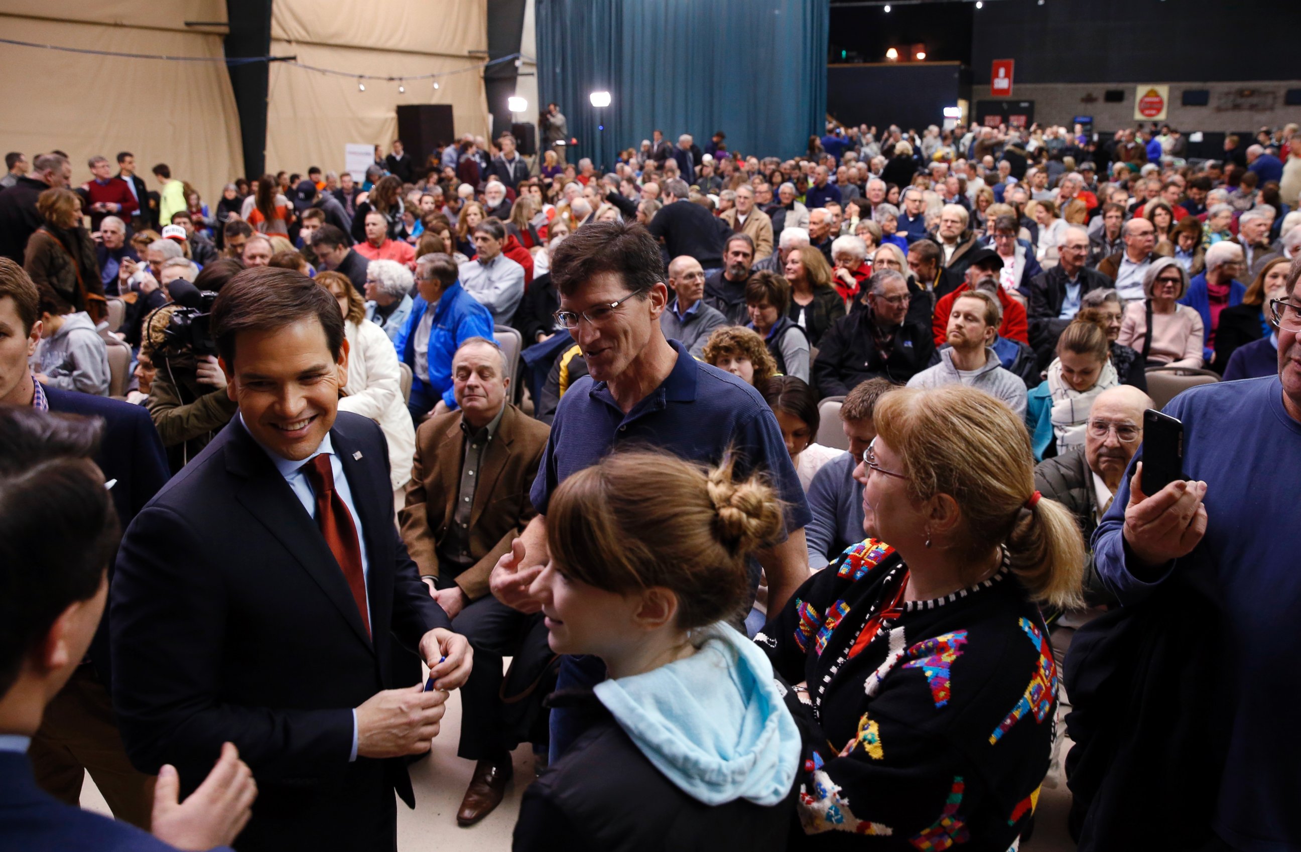 PHOTO: Republican presidential candidate Sen. Marco Rubio, talks with voters at a caucus site, Feb. 1, 2016 in Clive, Iowa.