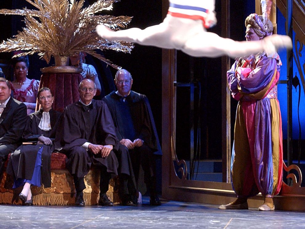 PHOTO: U.S. Supreme Court Justices Ruth Bader Ginsburg, Stephen Breyer, center, and Anthony M. Kennedy watch a ballet dancer as they play the roles of themselves in the Washington Operas production of Die Fledermaus in Washington, Sept. 6, 2003.