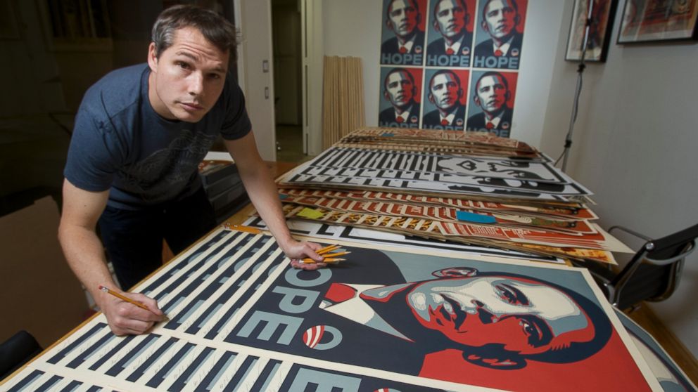 Artist Shepard Fairey is pictured signing his Barack Obama "HOPE" poster in the Echo Park area of Los Angeles on Jan. 12, 2009.