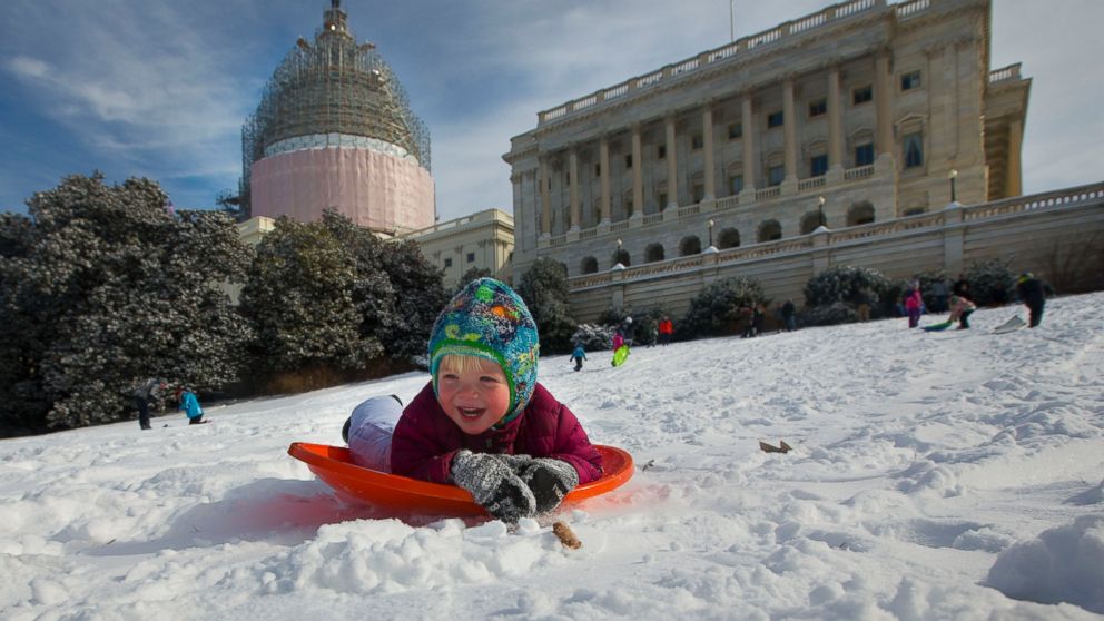 James Drobnyk, 2, joins others in sledding down the hill on Capitol Hill in Washington, D.C. on Feb. 17, 2015. 
