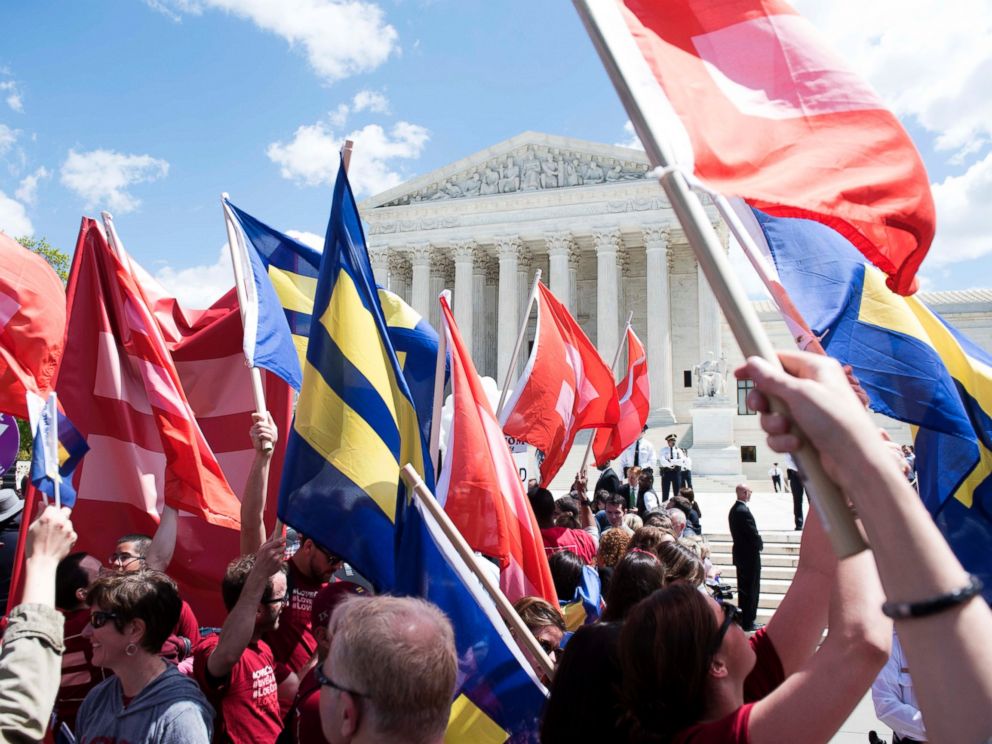 PHOTO: Supporters of marriage equality gather outside the Supreme Court to demonstrate support for LGBT couples, April 28, 2015 in Washington.