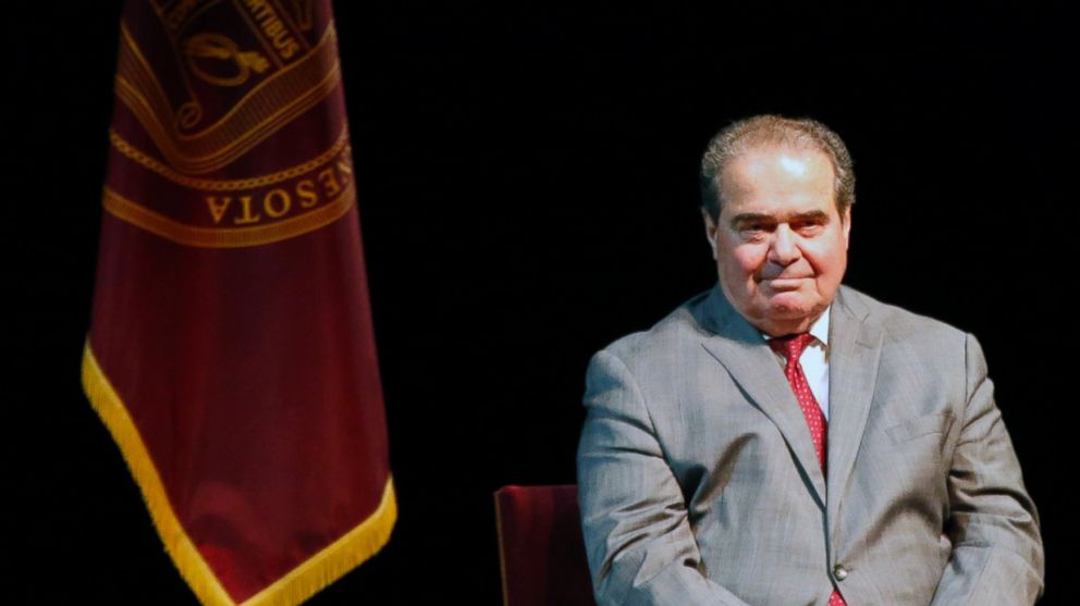 PHOTO: U.S. Supreme Court Justice Antonin Scalia waits during an introduction before speaking at the University of Minnesota as part of the law school's Stein Lecture series in Minneapolis on Oct. 20, 2015. 