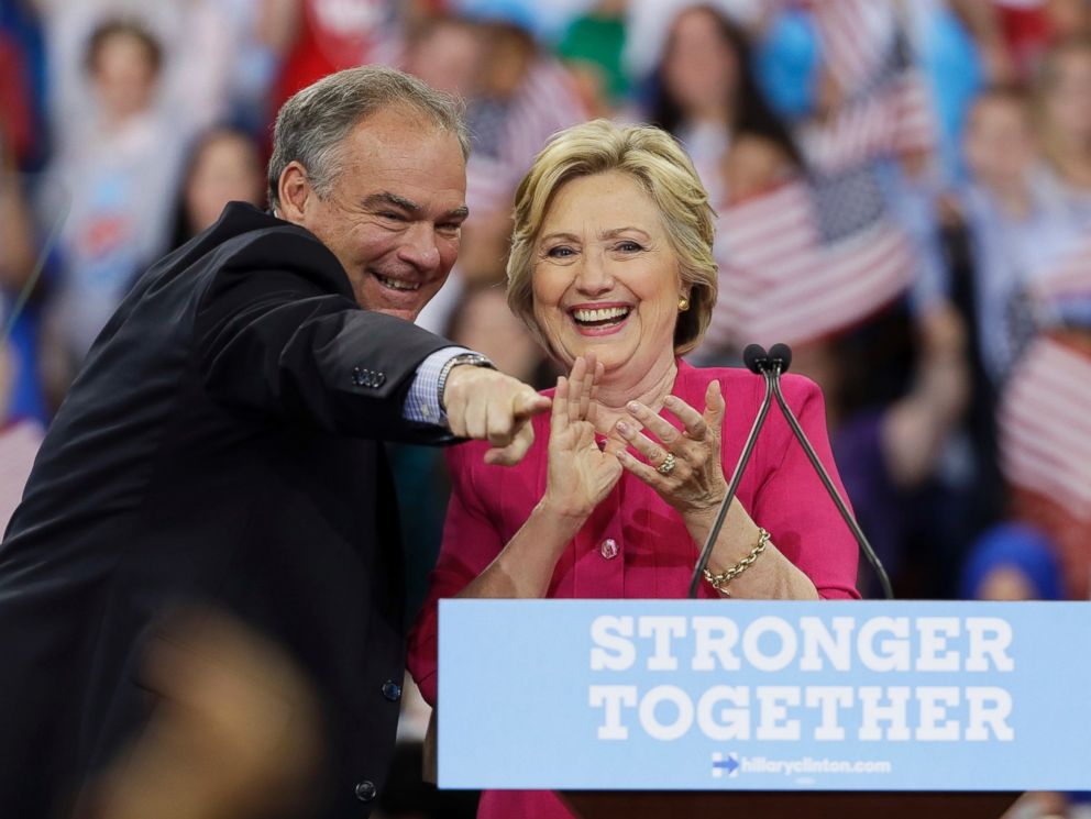 PHOTO: Democratic presidential candidate Hillary Clinton and her running mate, Democratic vice presidential candidate, Sen. Tim Kaine, react after a campaign rally at Temple University, July 29, 2016, in Philadelphia.