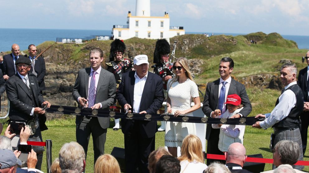 Donald Trump cuts a ribbon at the Turnberry hotel in South Ayrshire, Scotland, where the Trump Turnberry golf course has been revamped, June 24, 2016. 