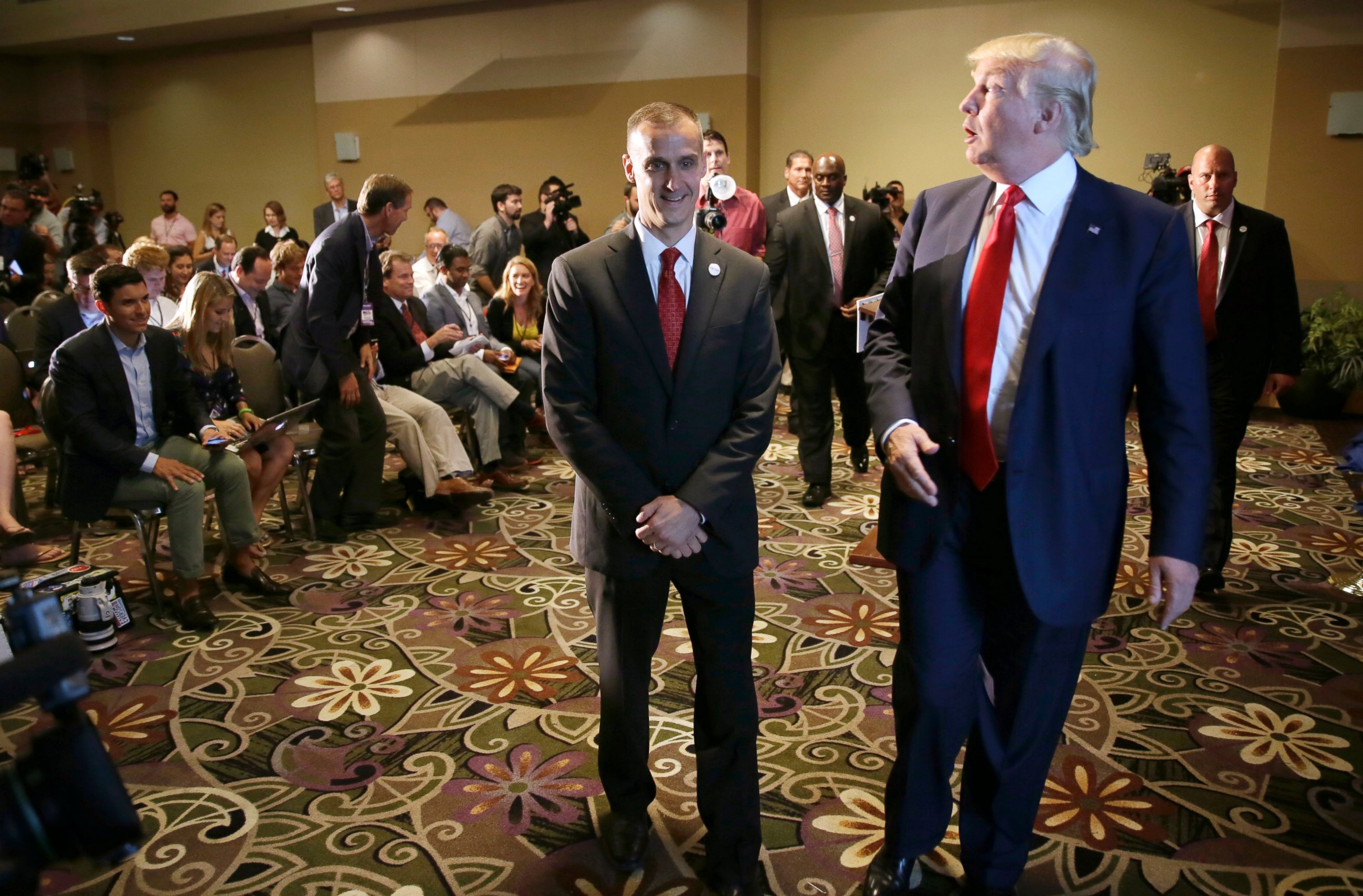 PHOTO: Donald Trump walks with his campaign manager Corey Lewandowski, left, after speaking at a news conference, Aug. 25, 2015, in Dubuque, Iowa.