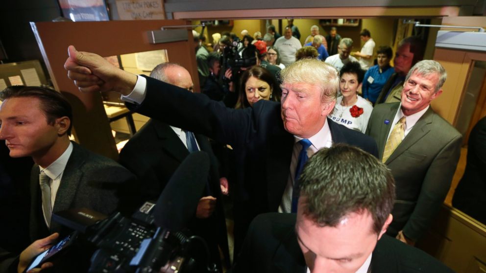 Donald Trump waves to supporters after meeting with volunteers at the local Pizza Ranch restaurant on Jan. 15, 2016, in Waukee, Iowa.