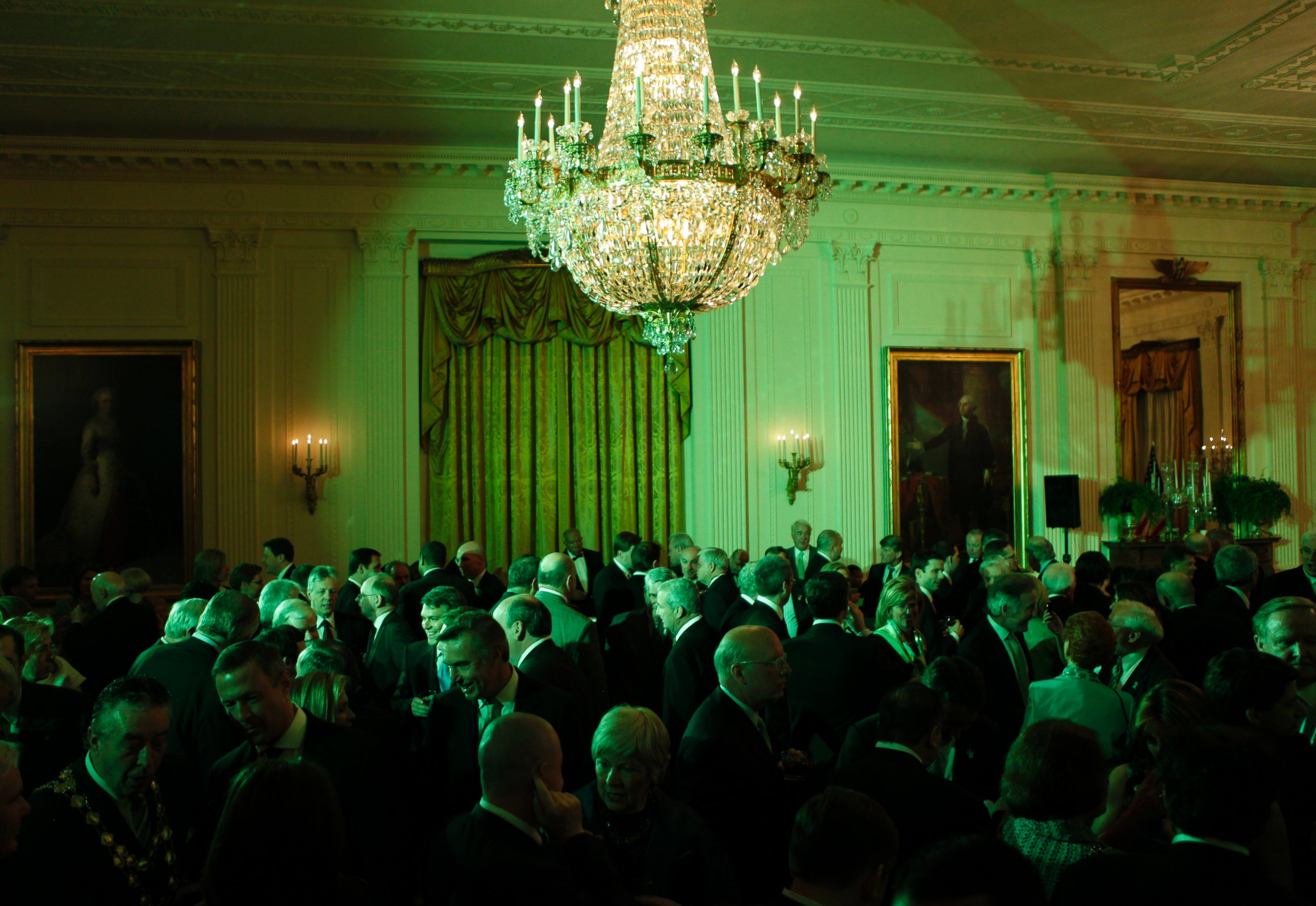 PHOTO: The East Room of the White House is bathed in green light at a St. Patrick's Day reception hosted by President Barack Obama in Washington, March 17, 2009.