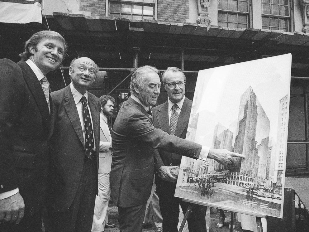 driving street PHOTO: Governor Hugh Carey points to an artists conception of the new New York Hyatt Hotel/Convention facility that will be build on the site of the former Commordore Hotel, June 28, 1978.