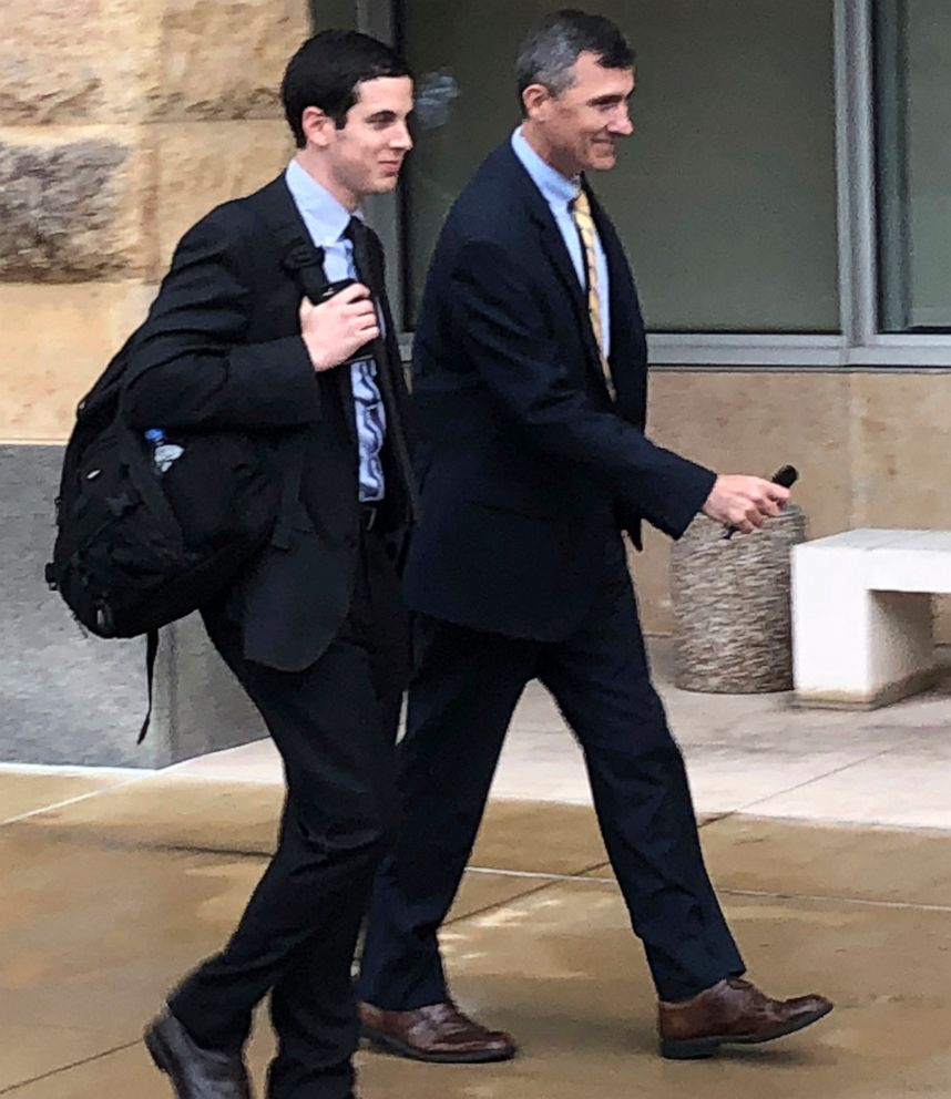 PHOTO: Gregory Bernstein, left, and FBI Special Agent Keith Custer walk outside the federal courthouse, in Greenbelt, Md., Oct. 11, 2018.