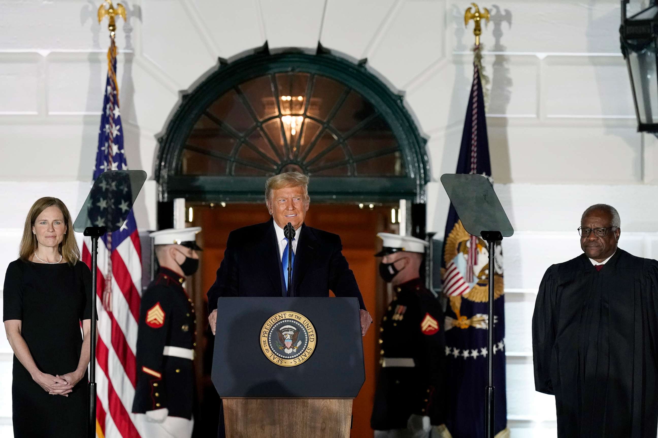 PHOTO: President Donald Trump speaks before Supreme Court Justice Clarence Thomas administers the Constitutional Oath to Amy Coney Barrett on the South Lawn of the White House White House, Oct. 26, 2020. 