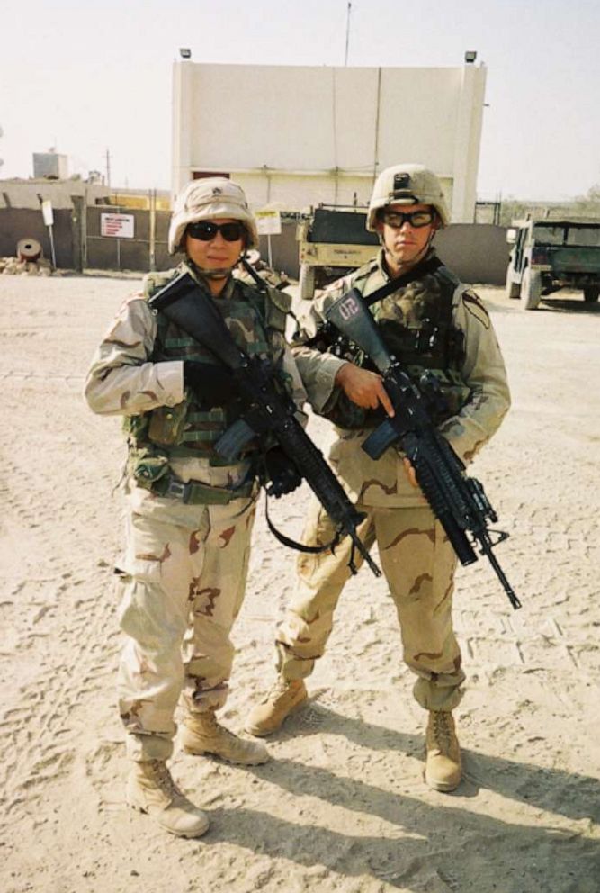 PHOTO: Ben Hayhurst with fellow-soldier Tuan Le after returning to Iraq in 2004.