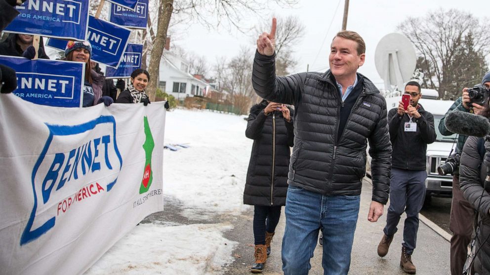 PHOTO:Democratic presidential candidate Sen. Michael Bennet greets supporters at the Webster Elementary School during the presidential primary, Feb. 11, 2020, in Manchester, N.H.