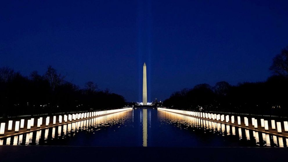 PHOTO: Lights surround the Lincoln Memorial Reflecting Pool, placed as a memorial to COVID-19 victims, Jan. 19, 2021, in Washington, D.C.