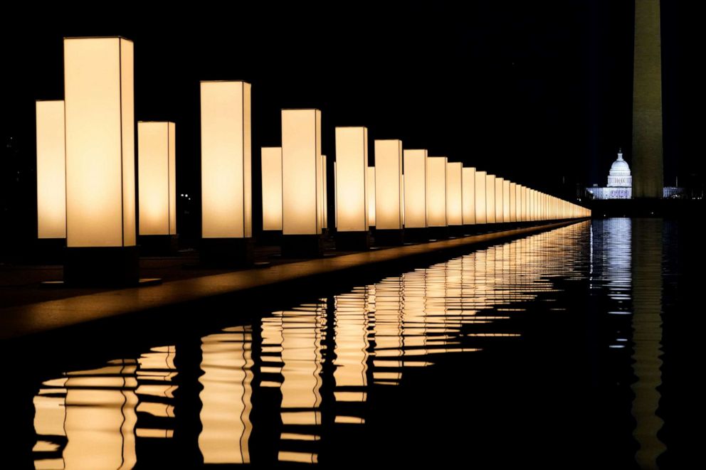 PHOTO: Lights surround the Lincoln Memorial Reflecting Pool, placed as a memorial to COVID-19 victims, Jan. 19, 2021, in Washington, D.C.