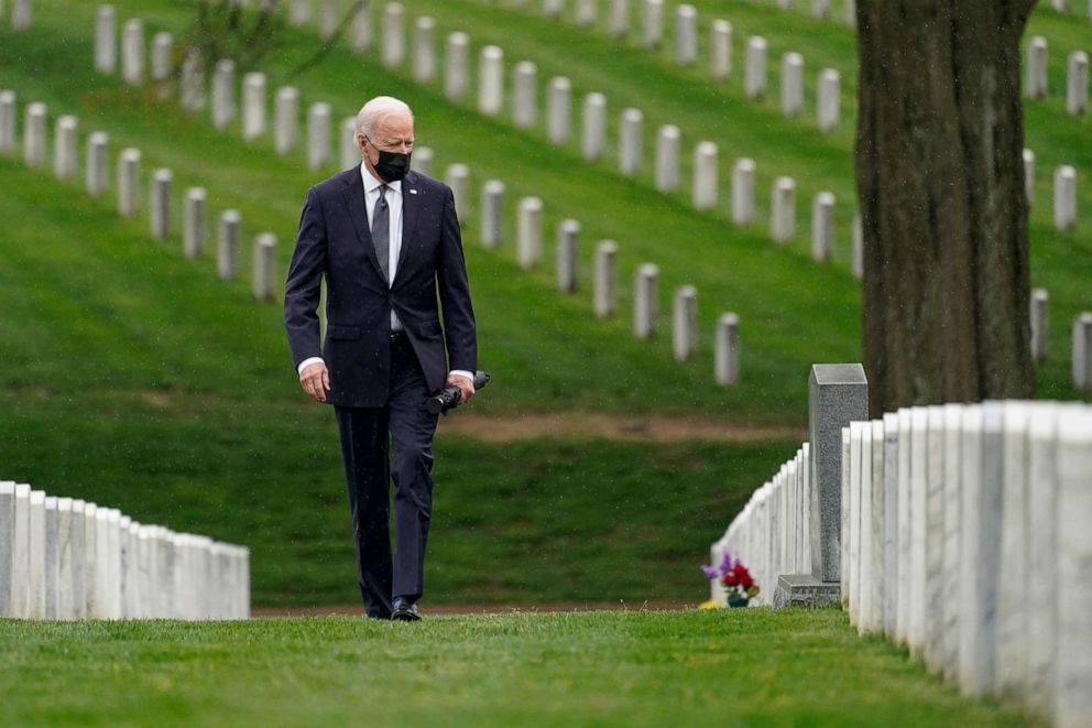 PHOTO: President Joe Biden visits Section 60 of Arlington National Cemetery in Arlington, Va., April 14, 2021. Biden announced the withdrawal of the remainder of U.S. troops from Afghanistan by Sept. 11, 2021.