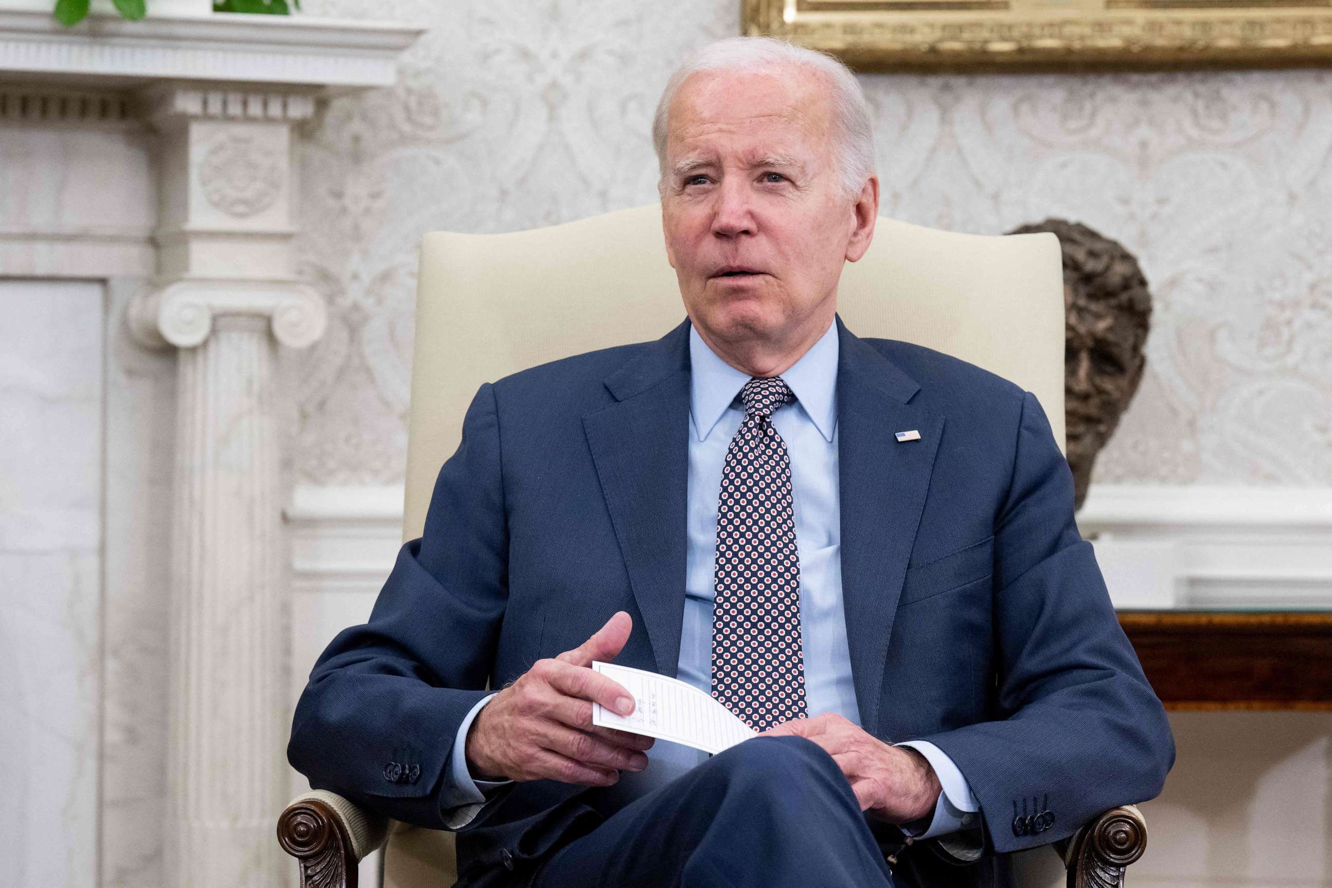 PHOTO: President Joe Biden speaks during a meeting on the debt ceiling with US House Speaker Kevin McCarthy (R-CA), not pictured, in the Oval Office of the White House in Washington, DC, on May 22, 2023.