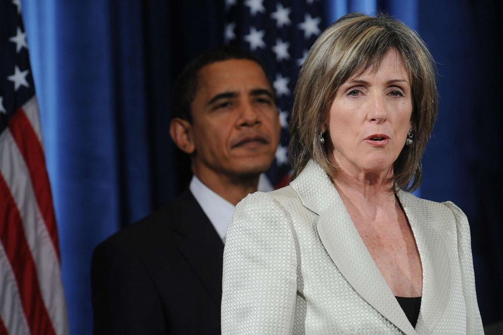 PHOTO: President-elect Barack Obama listens while Carol Browner speaks at a press conference in Chicago, Dec. 15, 2008.  