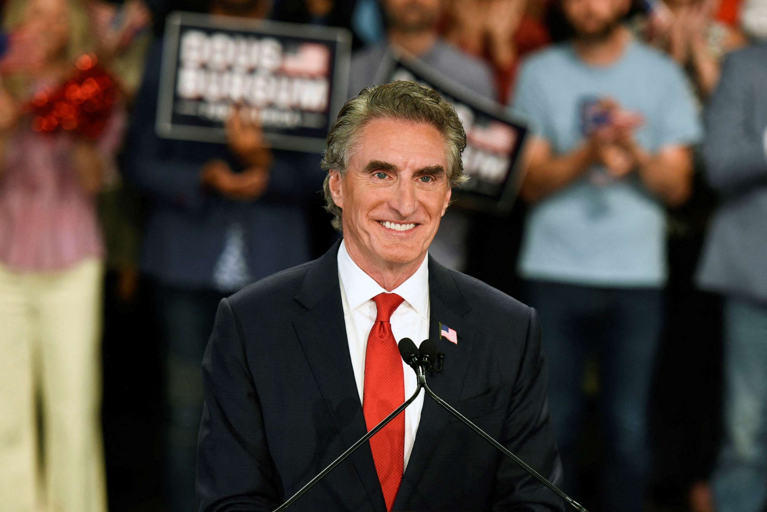 PHOTO: North Dakota Governor Doug Burgum reacts during an event for announcing he enters the 2024 presidential race, joining a growing field of candidates hoping to topple Donald Trump and secure the Republican nomination, in Fargo, N.D. June 7, 2023.