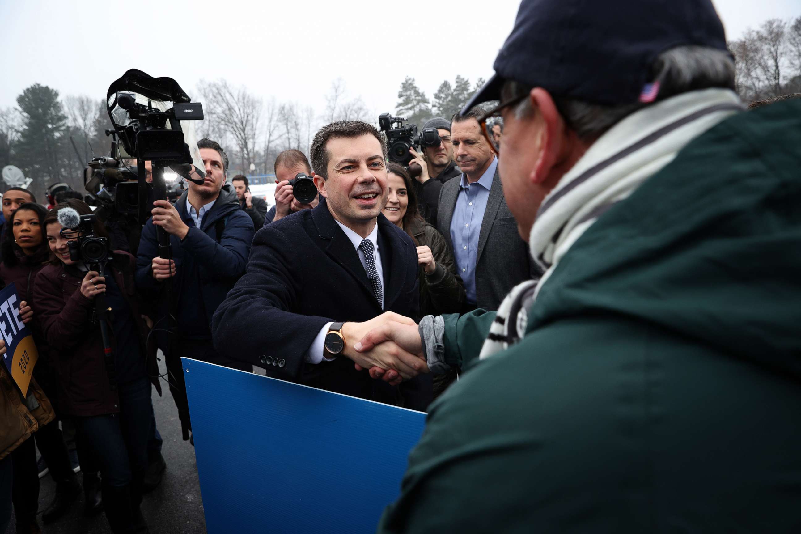 PHOTO: Democratic presidential candidate former South Bend Mayor Pete Buttigieg greets supporters outside a polling station at Broad Street Elementary School, Feb. 11, 2020 in Nashua, N.H.