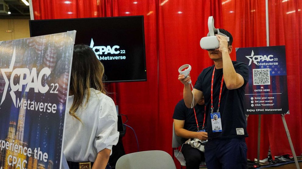 PHOTO: A person uses VR goggles during the Conservative Political Action Conference (CPAC) in Dallas, Aug. 4, 2022. 
