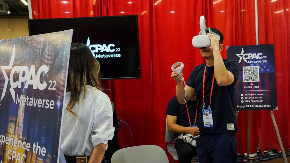 PHOTO: A person uses VR goggles during the Conservative Political Action Conference (CPAC) in Dallas, Aug. 4, 2022.