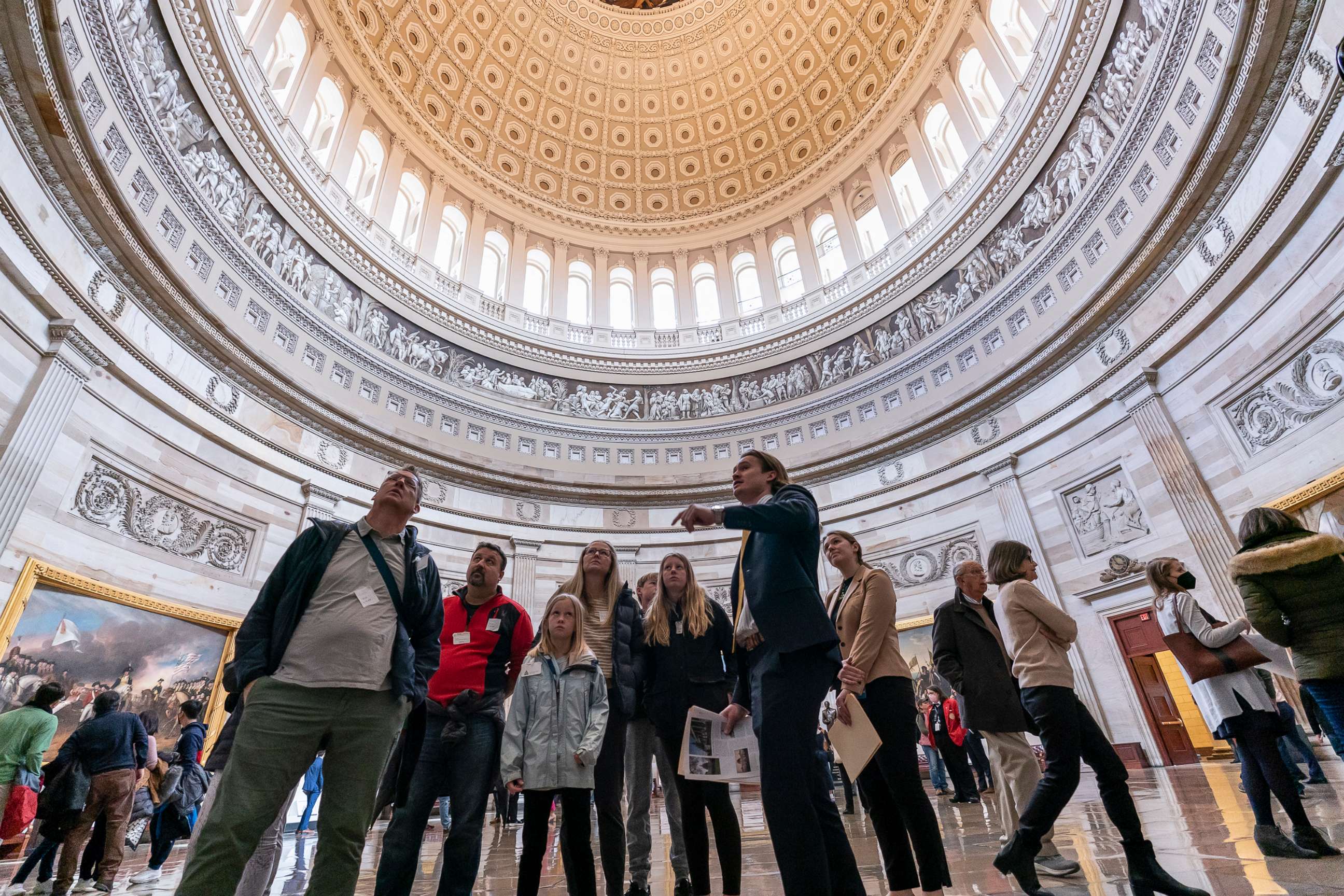 PHOTO: Tourists view the Rotunda as the Capitol opens to visitors for the first time since the beginning of the COVID-19 outbreak in early 2020, in Washington, D.C., March 28, 2022. 