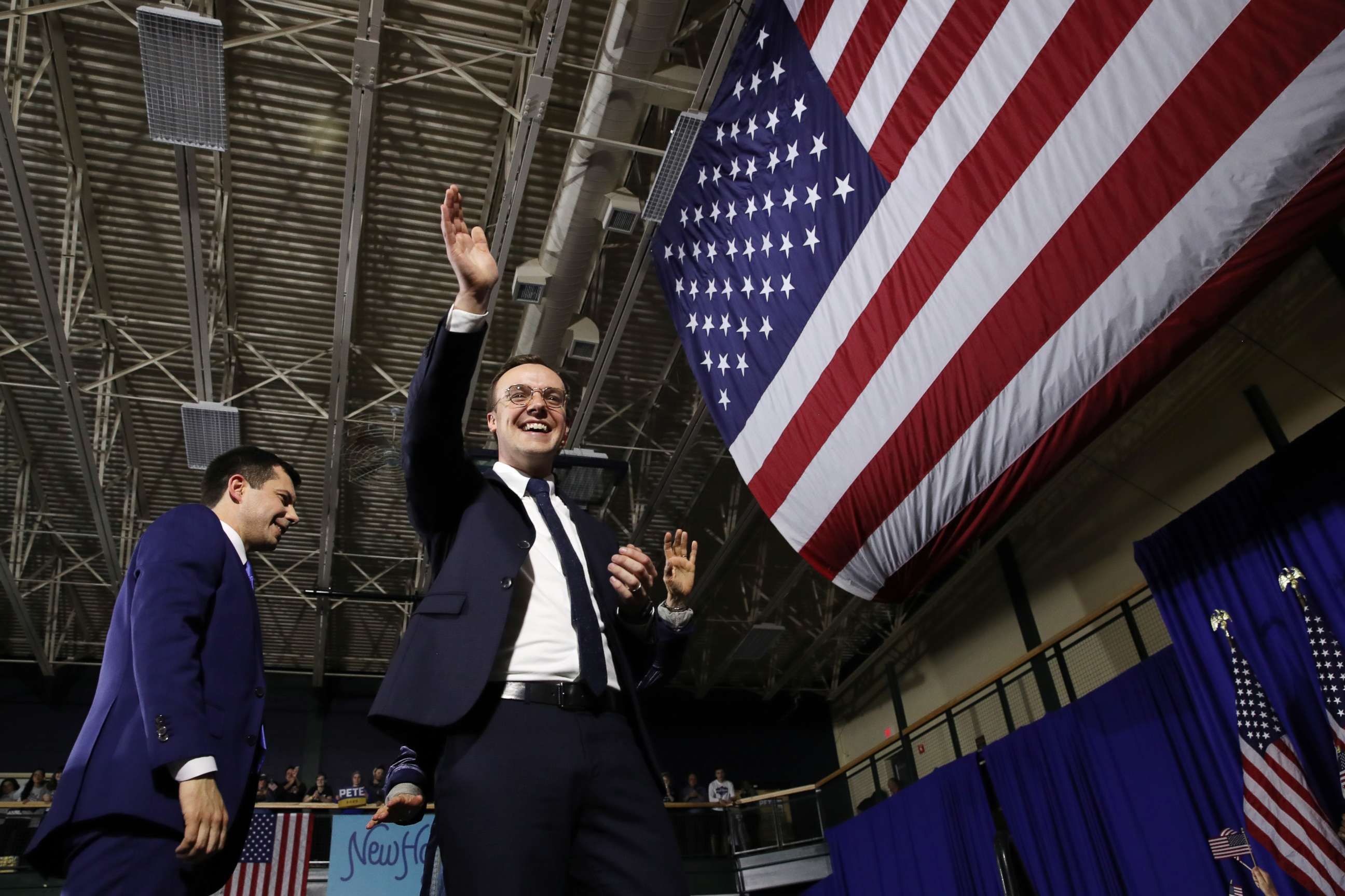 PHOTO: Chasten Buttigieg, husband of democratic presidential candidate former South Bend, Indiana Mayor Pete Buttigieg, waves to the crowd at his primary night watch party, Feb. 11, 2020 in Nashua, N.H. 