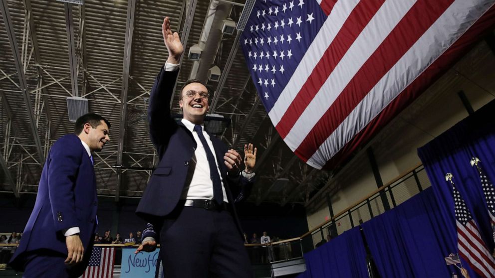 PHOTO: Chasten Buttigieg, husband of democratic presidential candidate former South Bend, Indiana Mayor Pete Buttigieg, waves to the crowd at his primary night watch party, Feb. 11, 2020 in Nashua, N.H. 