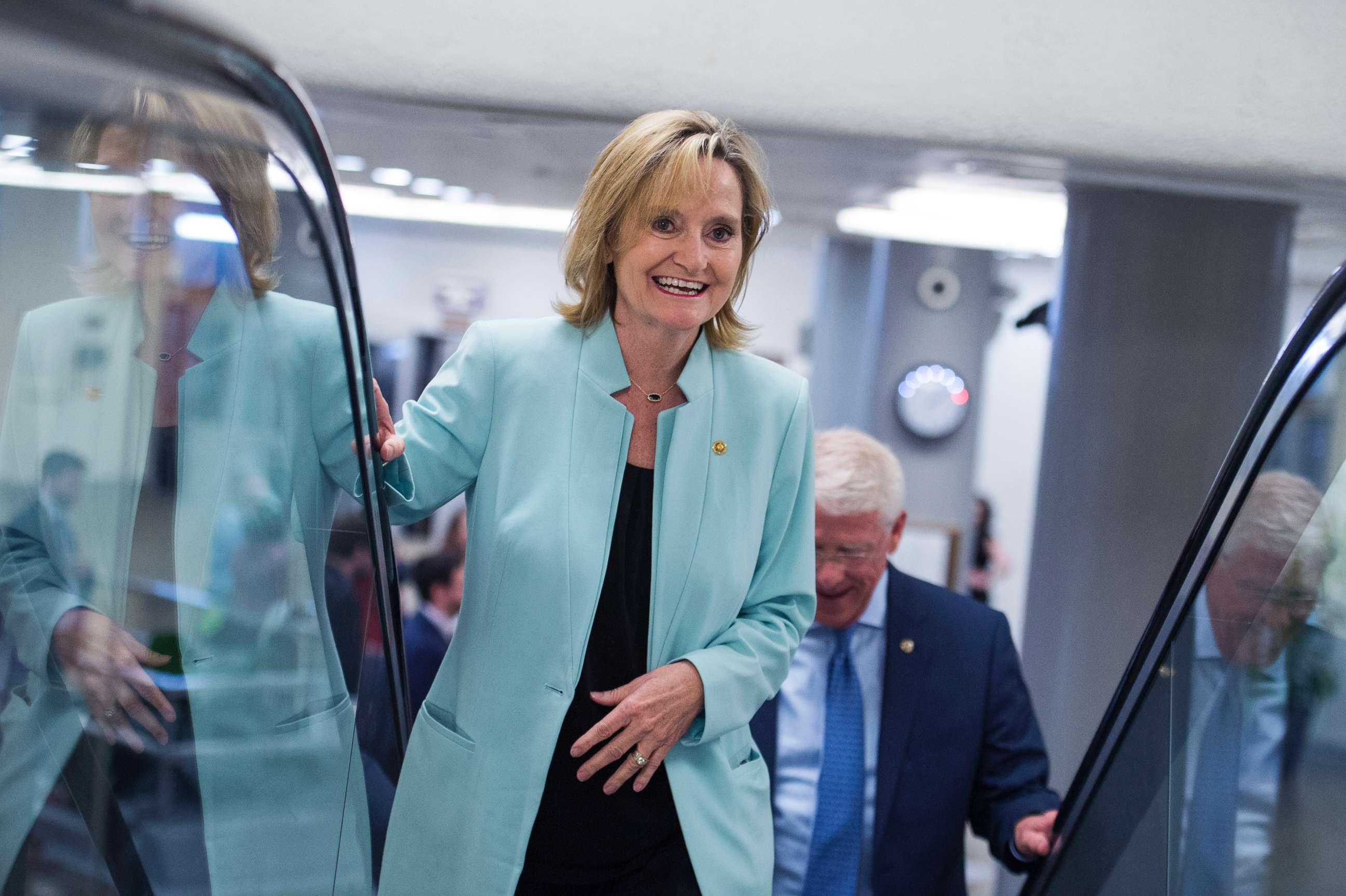 PHOTO: Senator Cindy Hyde-Smith heads to the Senate Policy luncheon in the Capitol, June 26, 2018.