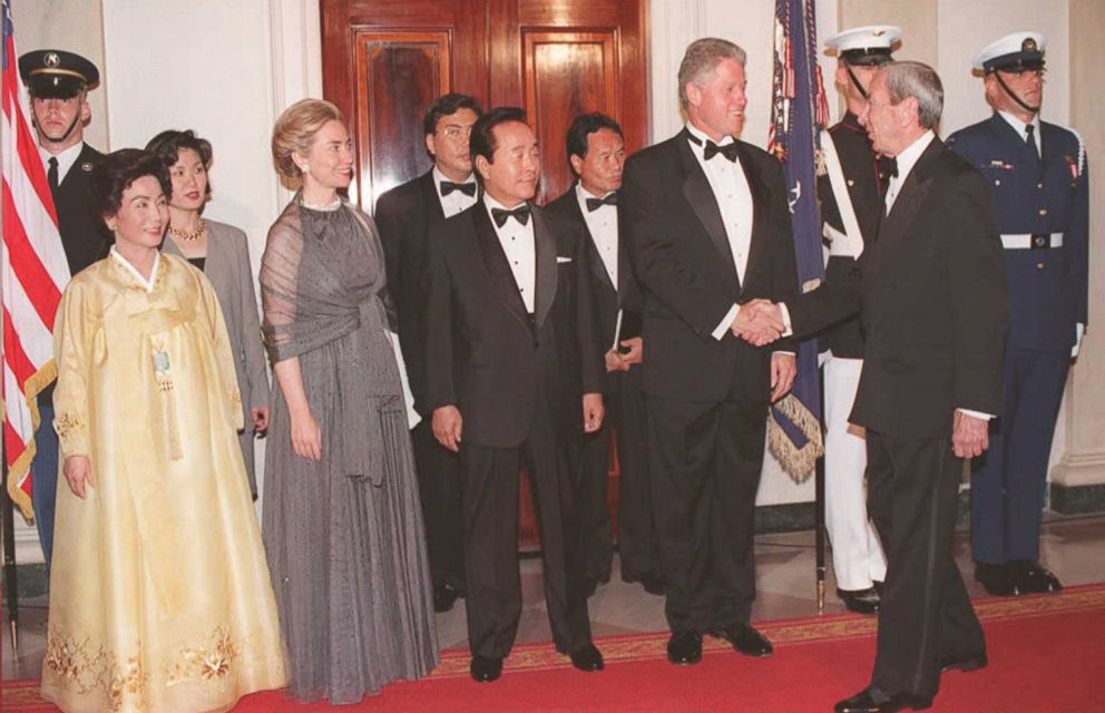 PHOTO: President Bill Clinton, accompanied by First Lady Hillary Clinton. greets Secretary of State Warren Christopher, right, on July 27, 1995, during a White House state dinner honoring South Korean President Kim Young-Sam, center, and Mrs. Kim, left.