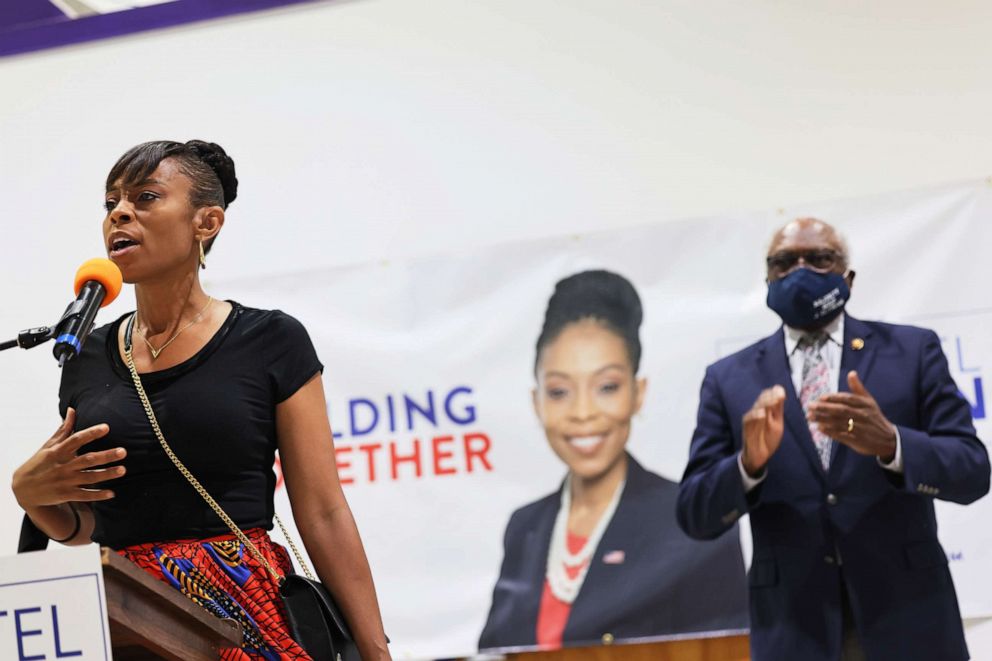 PHOTO: Cuyahoga Councilwoman and Congressional Candidate Shontel Brown speaks as Rep. James Clyburn claps during Get Out the Vote campaign event at Mt Zion Fellowship, July 31, 2021, in Cleveland.