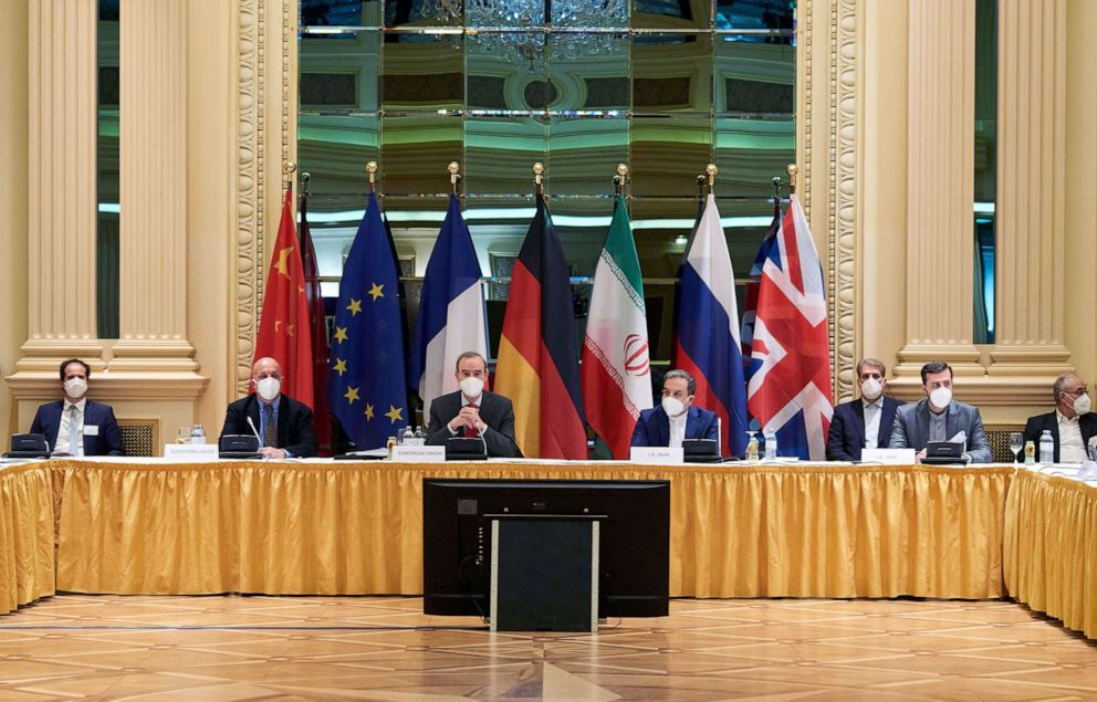 PHOTO: In this handout provided by the EU Delegation in Vienna, Representatives of the European Union (L) and Iran (R) attend the Iran nuclear talks at the Grand Hotel, April 6, 2021 in Vienna. 