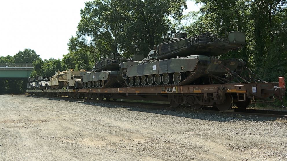 PHOTO: Two M1 Abrams tanks and two Bradley Fighting Vehicles transported to Washington DC for July 4 festivities are seen at a rail head in Washington D.C. 