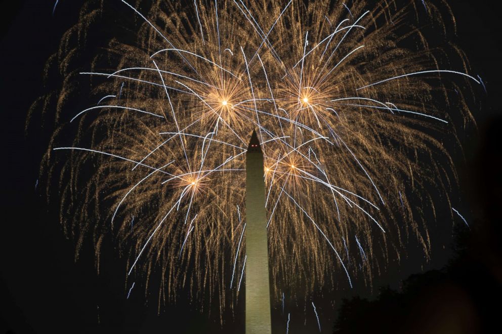 PHOTO: Thousands of Americans celebrate and observe the Annual Fourth of July Fireworks on Independence Day on the National Mall in Washington on July 04, 2018.