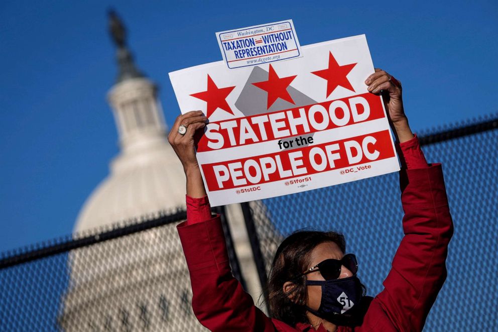 PHOTO: Residents of the District of Columbia rally for statehood near the U.S. Capitol on March 22, 2021 in Washington, D.C.