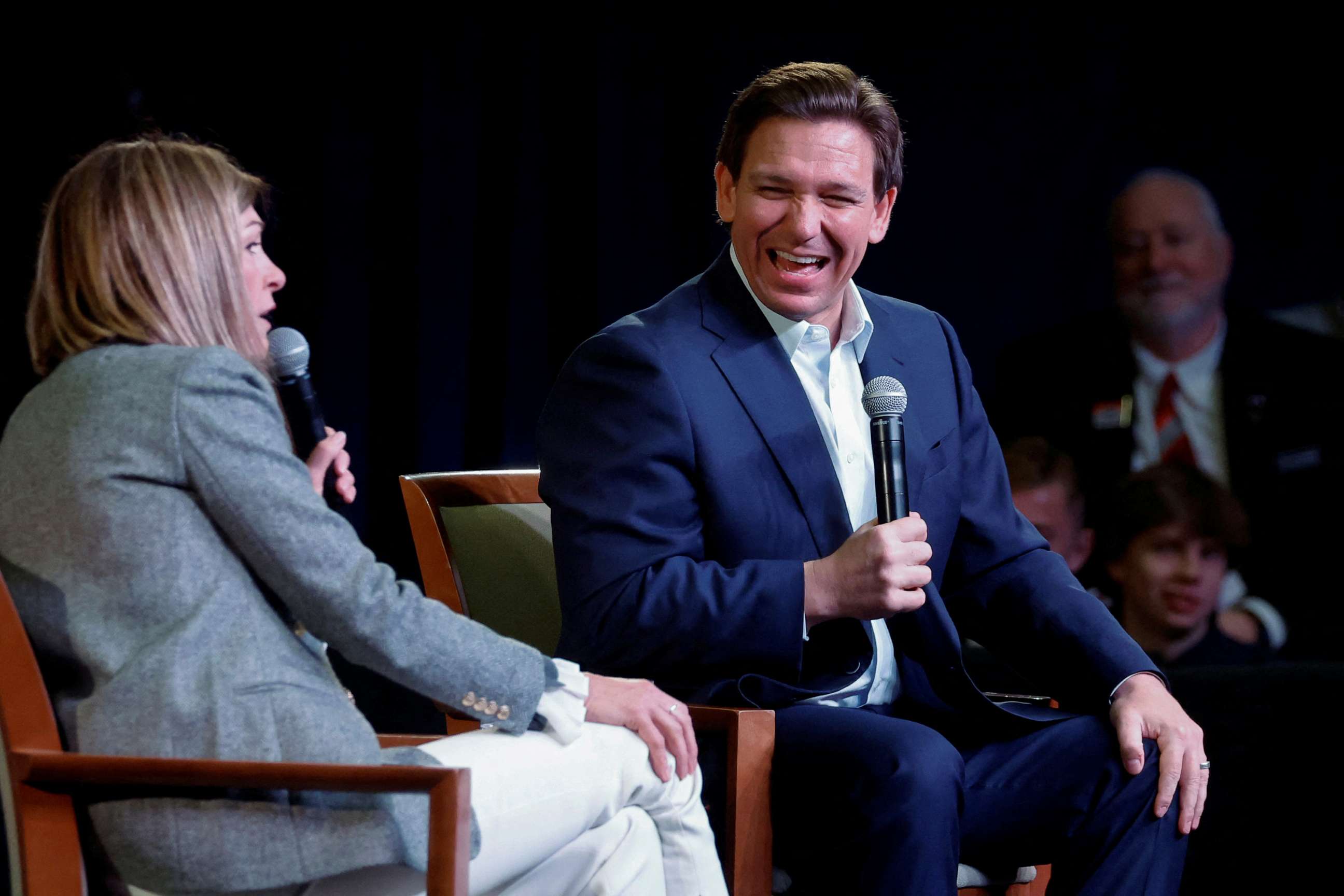 PHOTO: Florida Governor Ron DeSantis, with Iowa Governor Kim Reynolds, makes his first trip to the early voting state of Iowa on a book tour stop, in Davenport, Iowa, March 10, 2023.