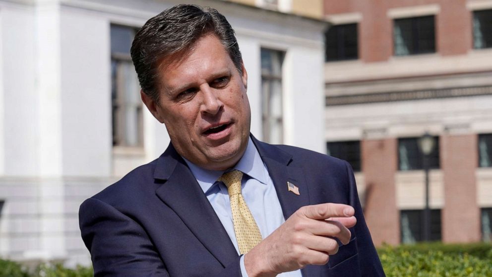 PHOTO: Geoff Diehl speaks to reporters outside the Statehouse, in Boston, March 21, 2022. 