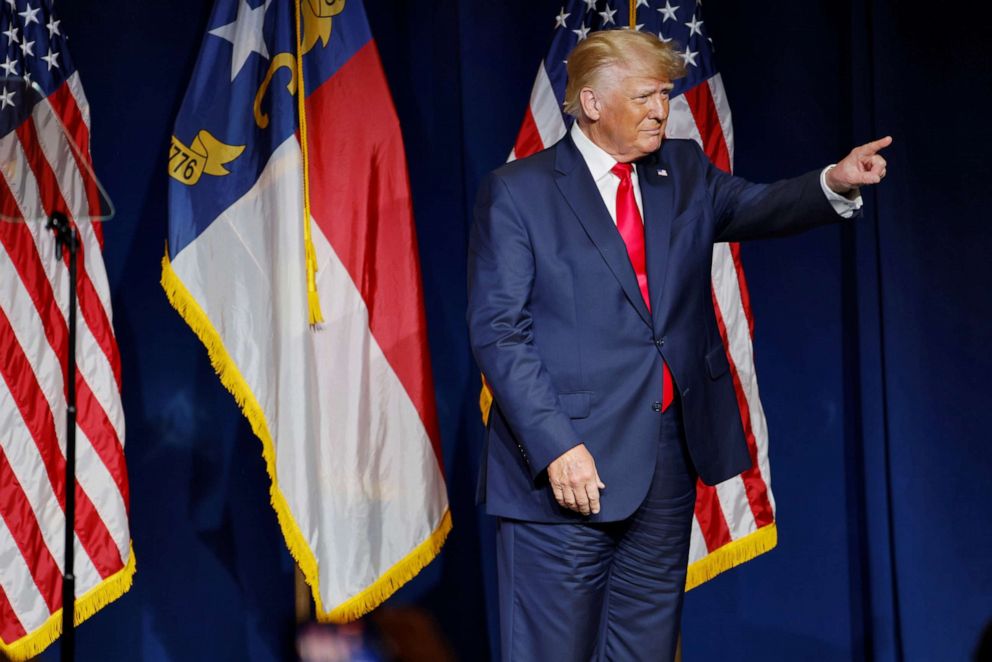 Former President Donald Trump stands on stage during an appearance at the North Carolina GOP convention dinner in Greenville, North Carolina, on June 5, 2021. 