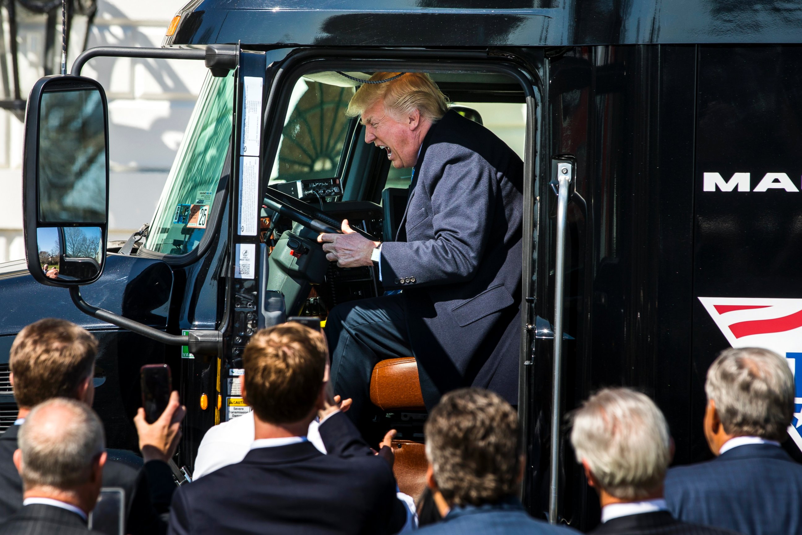 PHOTO: U.S. President Donald J. Trump gets in the driver's seat of an 18-wheeler while meeting with truck drivers and trucking CEOs on the South Portico prior to their meeting to discuss health care at the White House in Washington, March 23, 2017.
