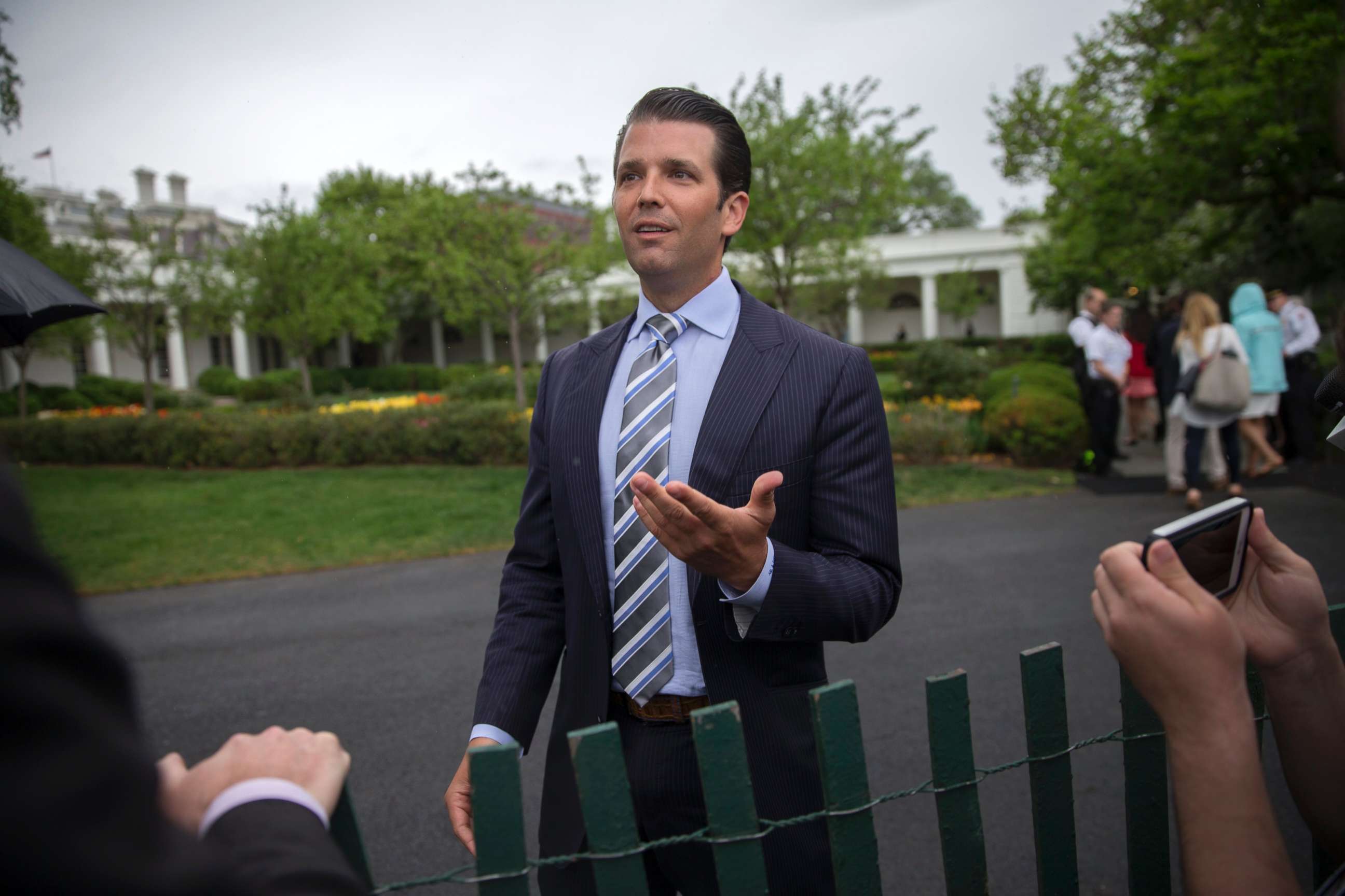 PHOTO: Donald Trump Jr. talks to reporters during the White House Easter Egg Roll on the South Lawn of the White House in Washington, April 17, 2017.