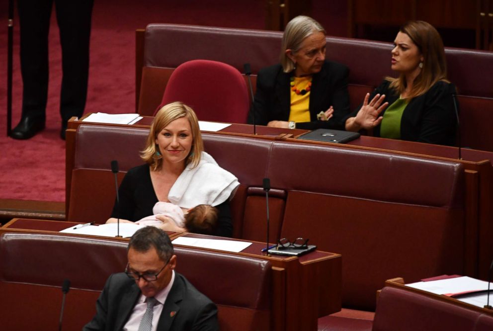 PHOTO: Greens Senator Larissa Waters breastfeeds her baby Alia Joy during a division in the Senate Chamber at Parliament House in Canberra, Australia, May 9, 2017 . Waters became the first politician to breastfeed in the Australian parliament.