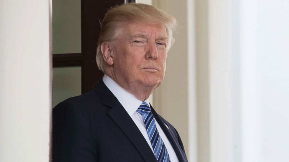 President Donald J. Trump stands in the entrance to the West Wing before greeting President of South Korea Moon Jae-in (not pictured), at the White House in Washington, D.C., USA, June 30, 2017.