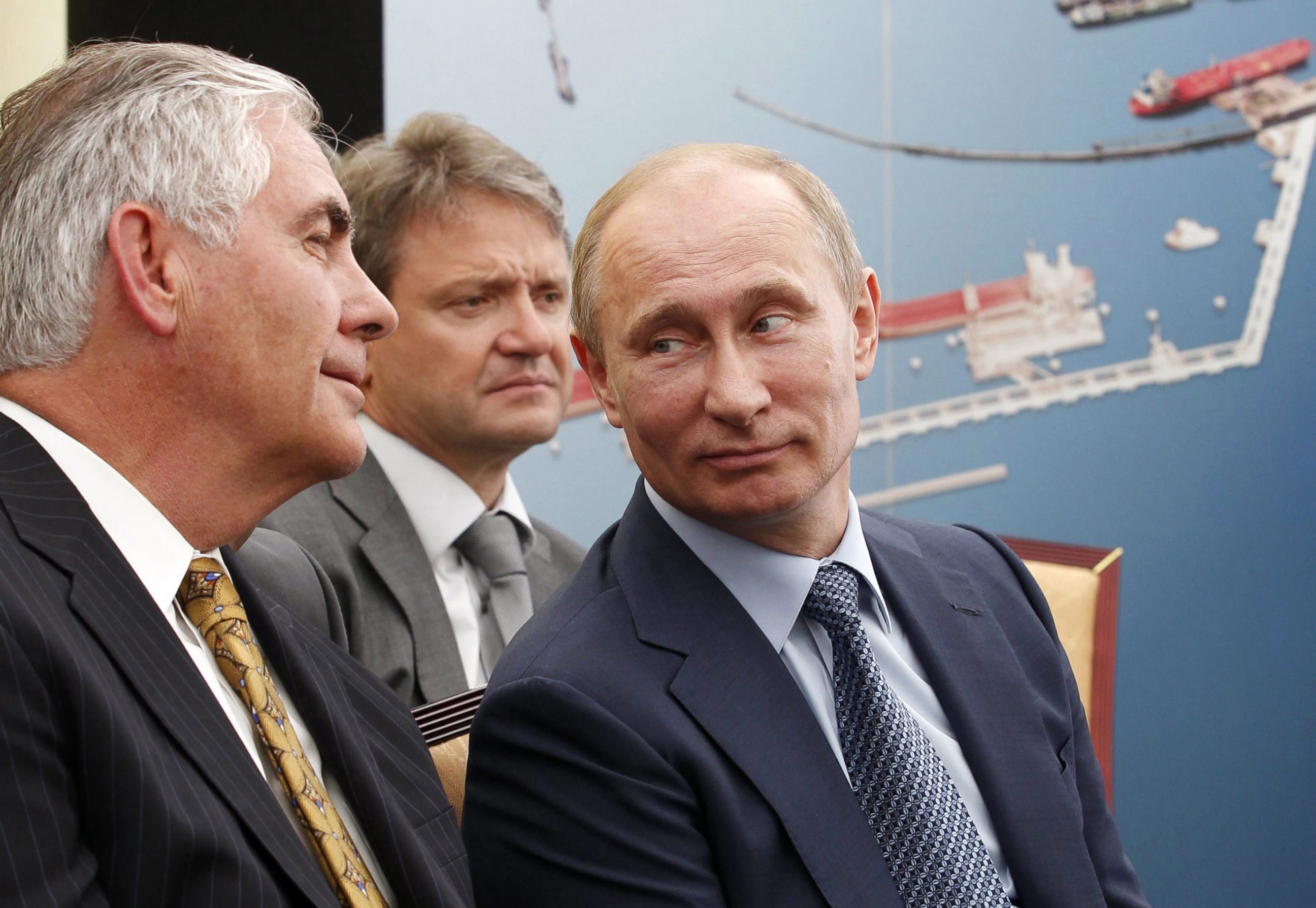 PHOTO: (L-R) ExxonMobil Chairman and CEO Rex Tillerson, Krasnodar region Governor Alexander Tkachev and Russian President Vladimir Putin are pictured in western Siberia at the Tuapse Refinery in Tuapse, Krasnodar region, Russia, June 15, 2012.