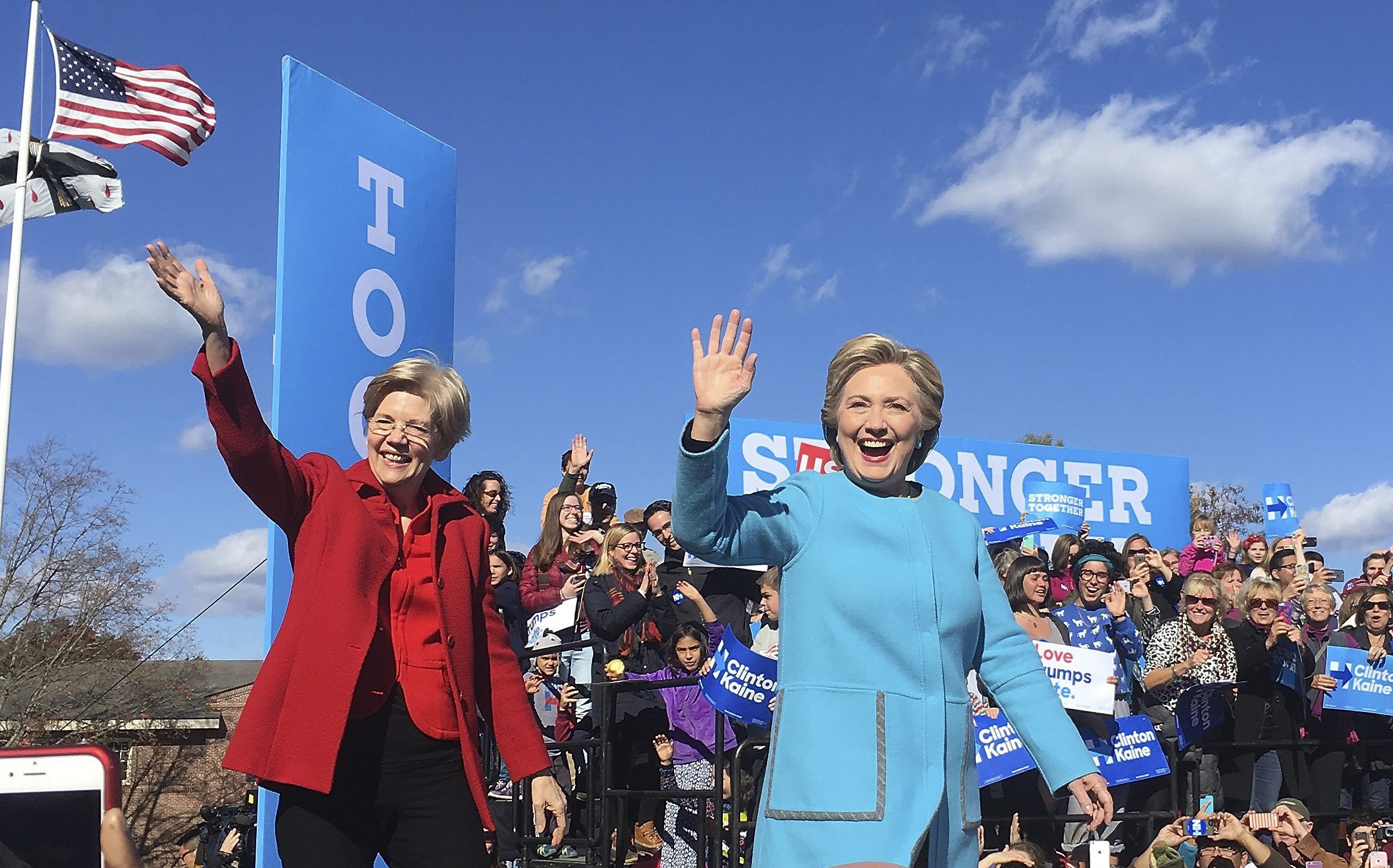 PHOTO: U.S. Senator Elizabeth Warren (L) and Democratic Candidate for U.S. President Hillary Clinton (R) wave as they arrive to a campaign rally at St. Anselm College in Manchester, New Hampshire, on Oct. 24, 2016. 